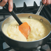 Cook the custard until it's thick and bubbly. Allow the filling to boil for 1 minute to eliminate any starchy flavor from the flour and cornstarch. 