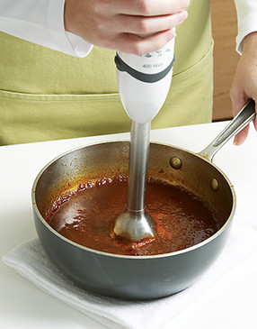 Allow sauce to cool a little before puréeing. Reserve half of it to serve at the table.