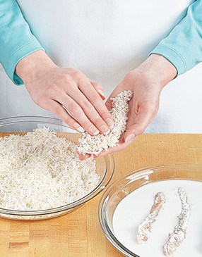To help the coating adhere, press the coconut-panko mixture into the tenders, then chill 1&ndash;2 hours.