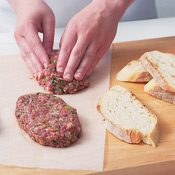 Shape the burgers to fit the bread or buns you're using. If using French bread, shape mixture into oval-shaped patties. 