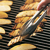 Once the fries have grill marks, turn them often so they can cook through without charring or burning.