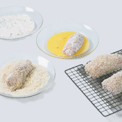 Coat chicken in flour, dip in egg, then coat with panko. Transfer coated chicken to a drying rack. 