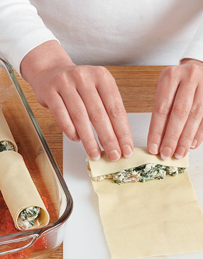 To form manicotti, scoop &frac14; cup filling onto one end of each pasta sheet, then roll up pasta sheet.