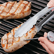 Insert an instant-read thermometer into the side of the chop to check for doneness.