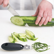 Run a zester down the length of the cucumber for an attractive finish. Slice it on the bias, then into half-moons.