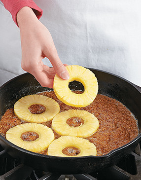 So the caramel doesn't overcook, turn off heat when adding pineapple rings to the top.