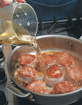 Deglazing the pan with cider, wine, and vinegar, will release brown bits stuck on the bottom of the pan.