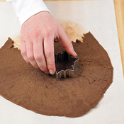 Cut cookies close together. Gather scraps of dough, roll again, and chill before cutting more shapes. 