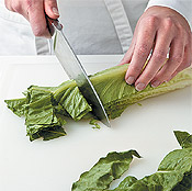 Cut head of romaine into quarters, then slice crosswise into bite-size pieces. Toss to separate the pieces.