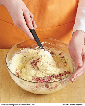 Fold corned beef into waffle batter so you don't lose the volume created by the leavener.