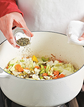 Add herbs and sweat vegetables &mdash; they'll release their moisture and provide a flavor base for the vegetable beef soup.