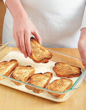 Toasting bread under the broiler first dries it out, allowing it to soak up more of the egg-cream mixture.