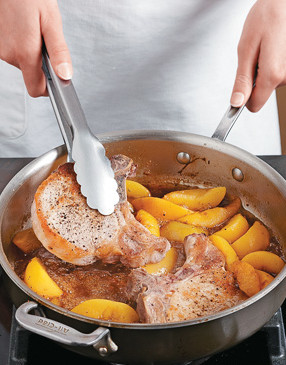 Finish cooking the chops in the bourbon-maple glaze. Push the peaches to the side to make room.