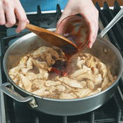 Add barbecue sauce, vinegar, and lime juice to saut&eacute;ed chicken. Set chicken mixture aside until ready to assemble pizzas. 