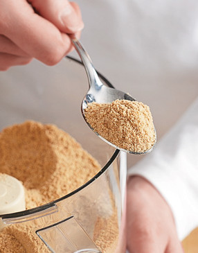 Grind the crumbs until fine. Rather than being a sandy consistency, they should be almost a powder.
