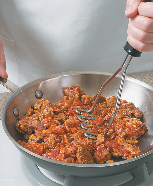 Cook Ground Meat Faster by Using a Potato Masher