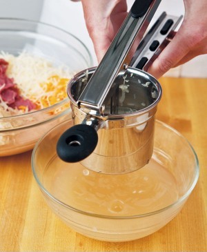 Remove Excess Liquid by Squeezing Sauerkraut