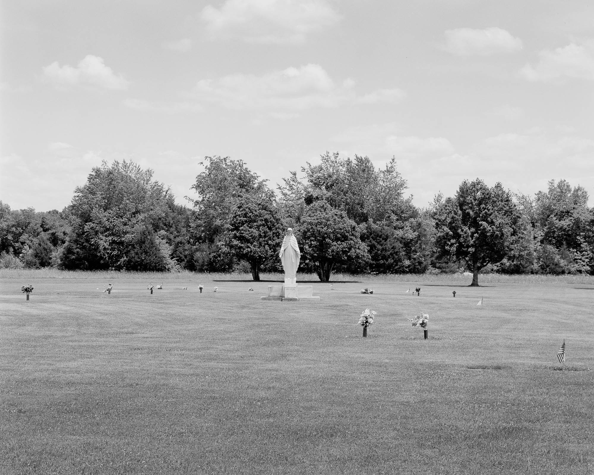 statue of mary in cemetery