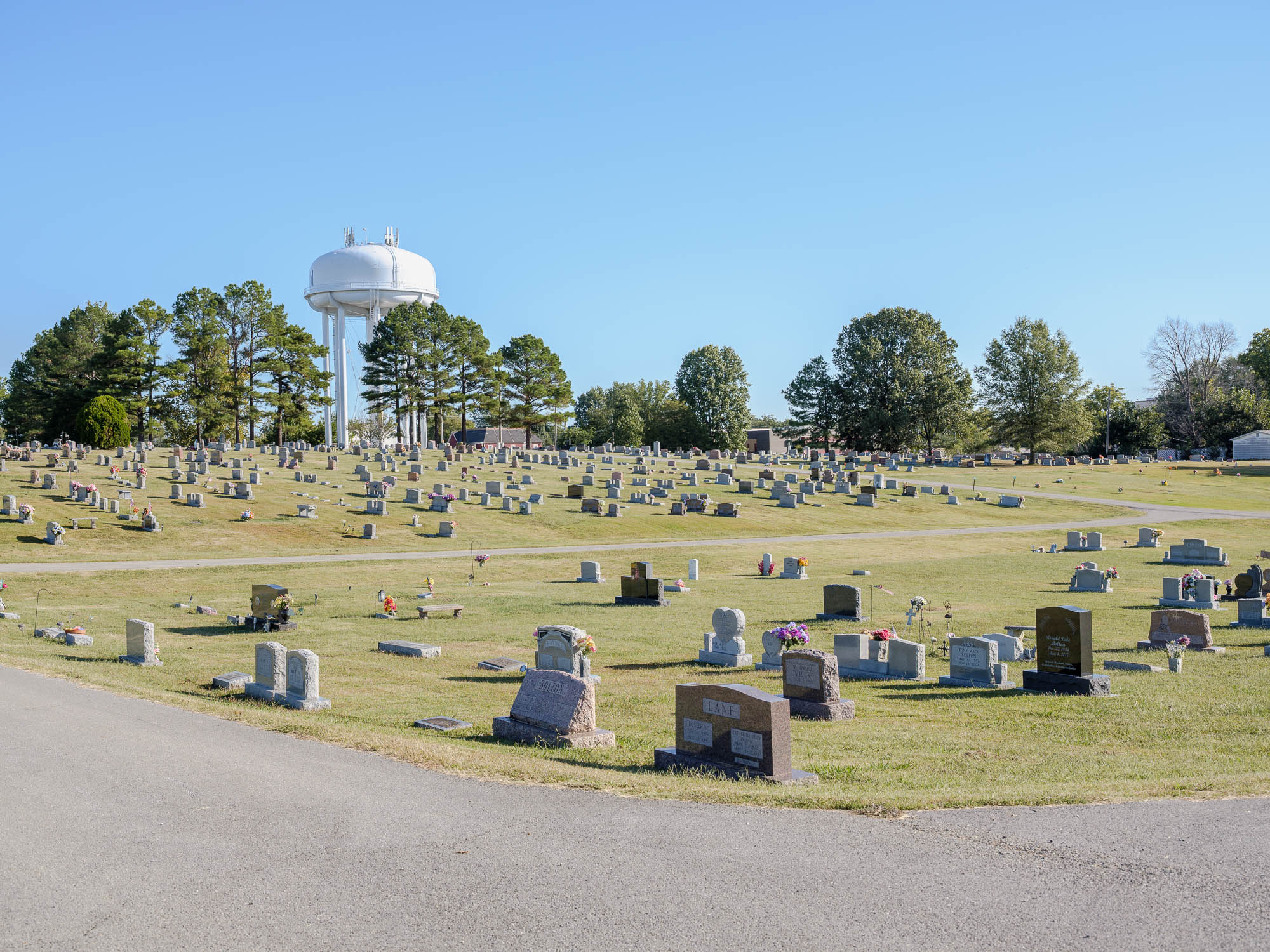 cemetery with water tower in background