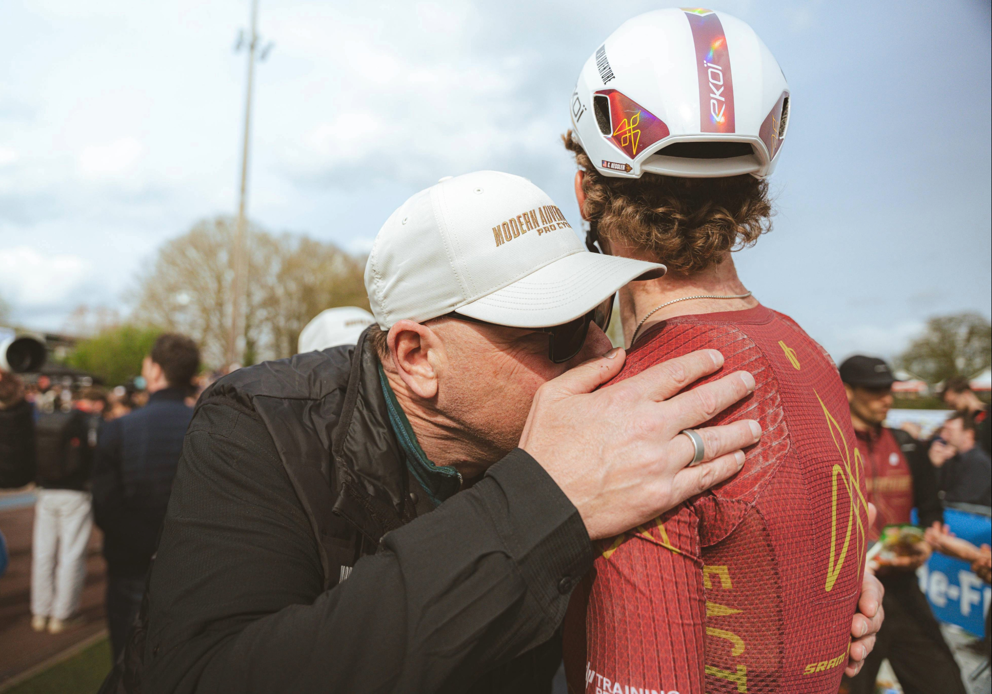 Cole Kessler from Modern Adventure Pro Cycling hugs his father after finishing Paris Roubaix 2026