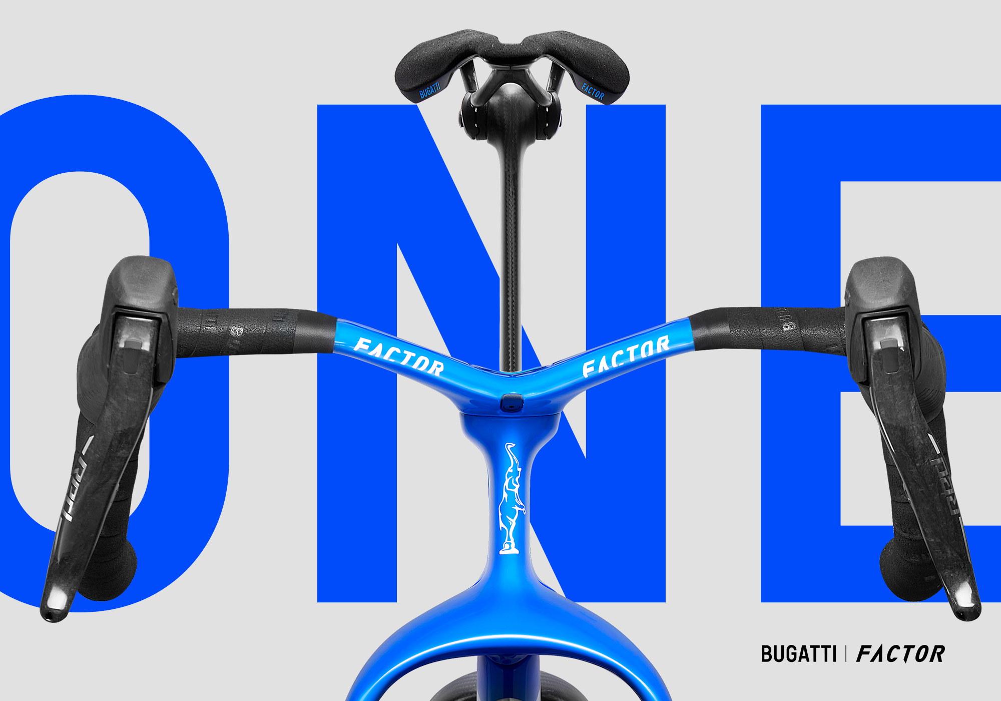 The Bugatti Factor ONE bicycle superimposed in front of ONE written in large blue letters.