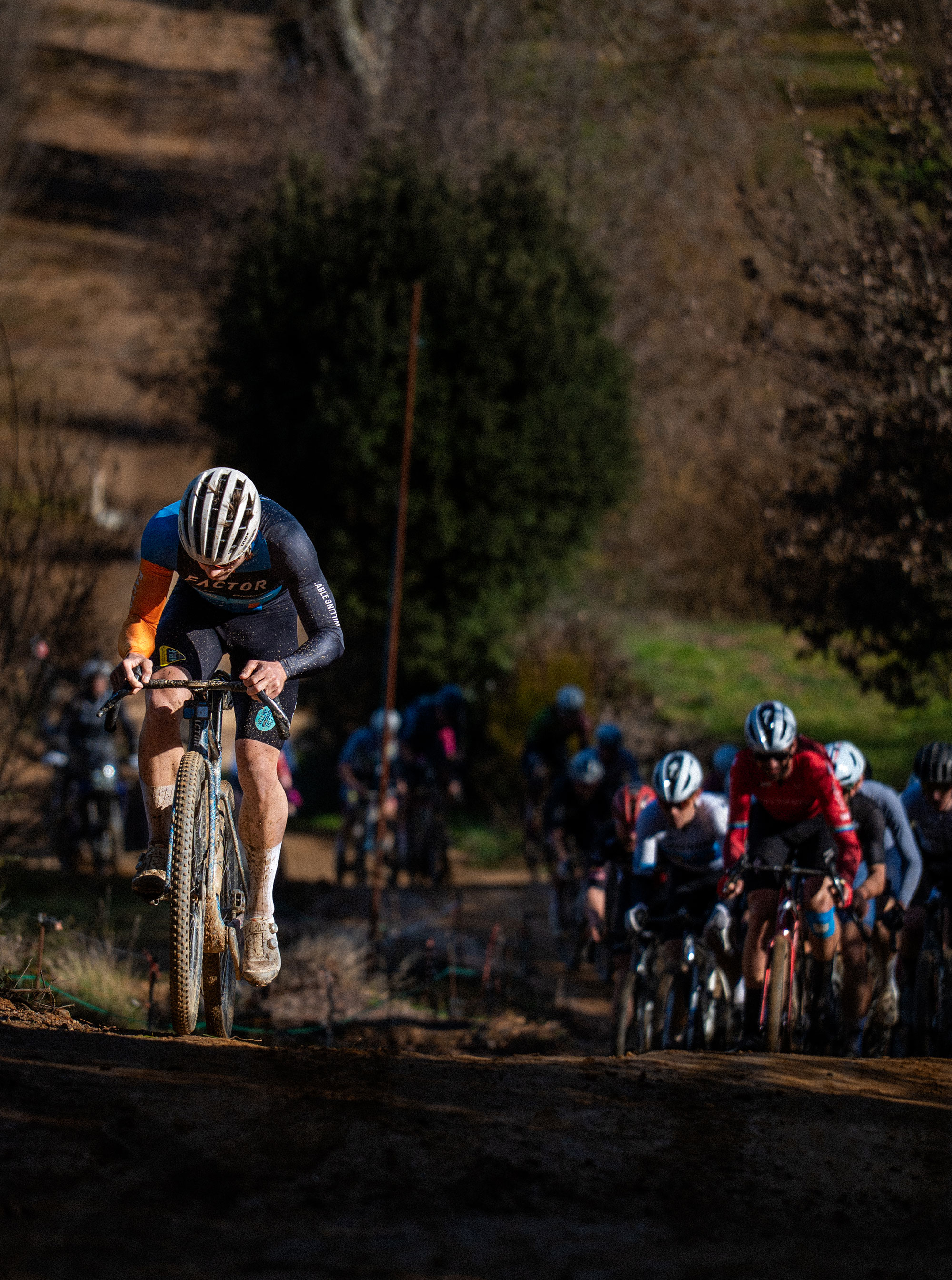 Jonas Linberg of Factor Racing leading the peloton up a gravel climb