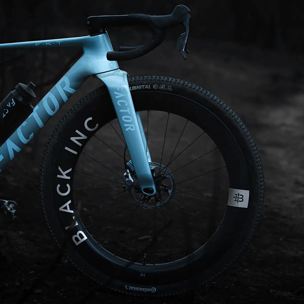 Side view of the ELARA front end highlighting the Black Inc 64 Gravel front wheel.