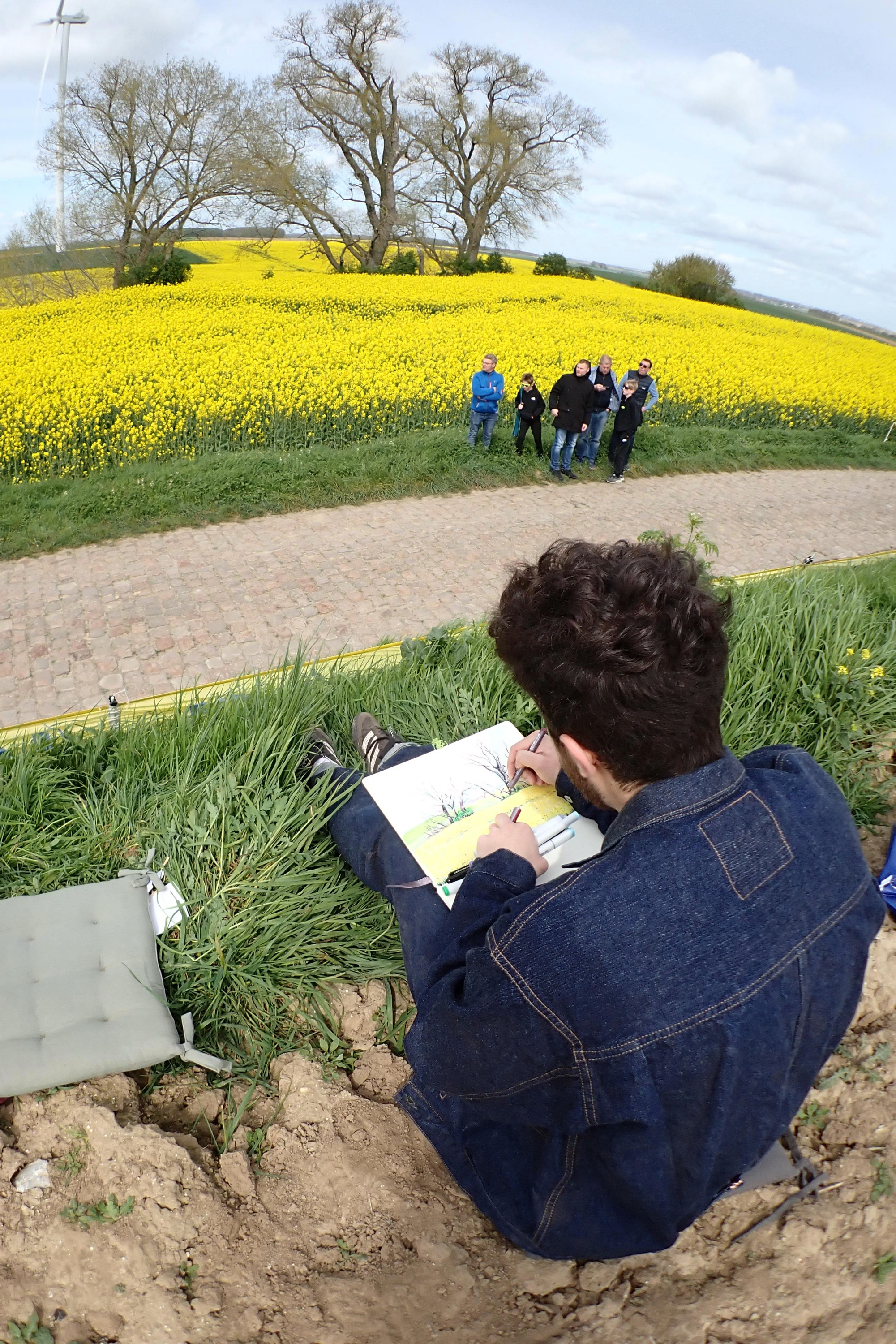 VEXX Drawing at Paris Roubaix while waiting for the peloton to come through