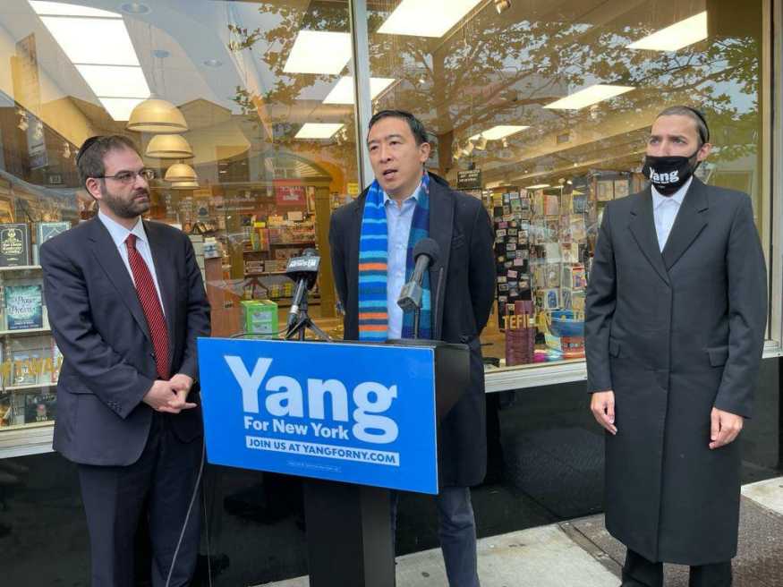 Andrew Yang with Simcha Eichenstein and Kalman Yeger