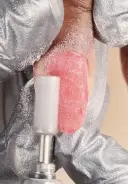 Refine the surface of nails with a 180-grit file or an e-file and a medium grit carbide bit