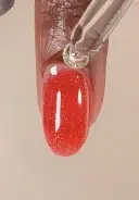 Apply a drop of Nail & Cuticle Oil to the base of each nail and massage in