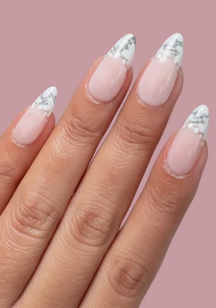 Add some romance to your wedding nails with a delicate lace design