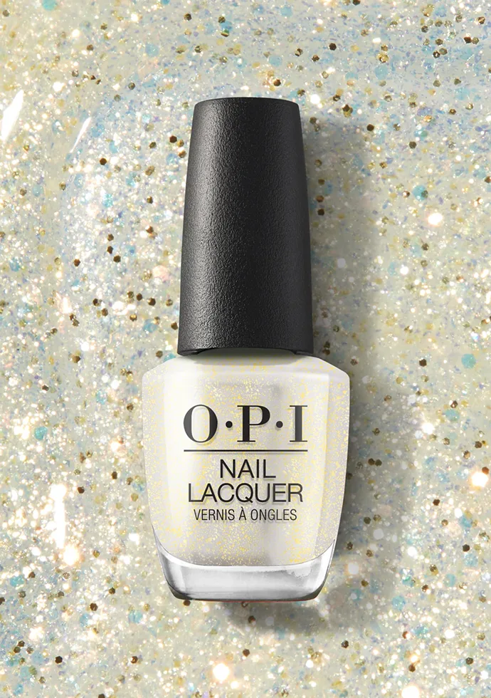 Glitterally Shimmer: Gold glitter nail polish with a sheer yellow base