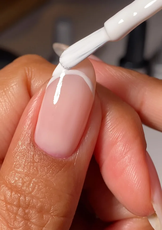 Paint your tips in a classic white shade like GELement’s Snow Angel