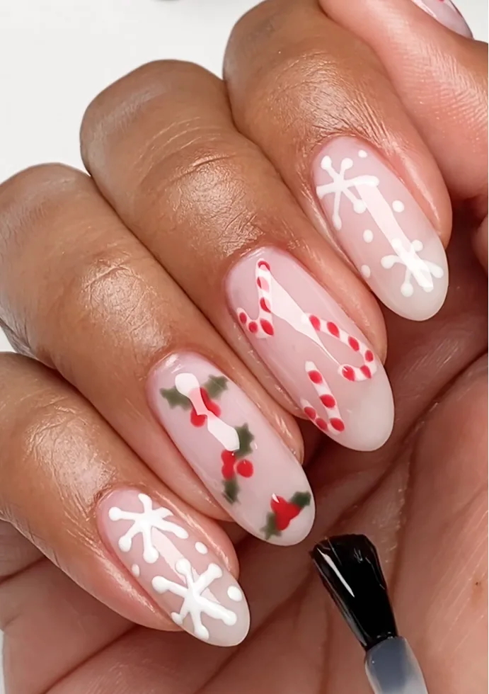 Candy cane nails, check. Snowflake nails, check. Holly nails, check, check, and check! Candy cane nails, check. Snowflake nails, check. Holly nails, check, check, and check!