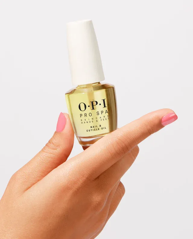 nail-and-cuticle-oil-as201-prospa-22006696000-hand-and-bottle