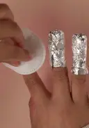 NAIL CARE - REMOVE RESIDUE: Saturate a pad with acetone and scrub nails to remove any residue