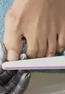 Trim nails and shape with a 240-grit file. 