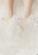 Return feet to footbath and rinse away scrub. Dry feet with a towel
