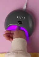COLOR - THUMB: Repeat application steps on the thumb and cure in the GELement™ Lamp for 60 seconds