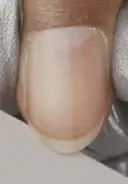 Trim nails if needed and shape as desired with a 240-grit nail file