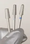 Use a cuticle removal tool to remove any remaining cuticle from the nail