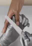 Trim nails if needed and shape as desired with a 240-grit file.