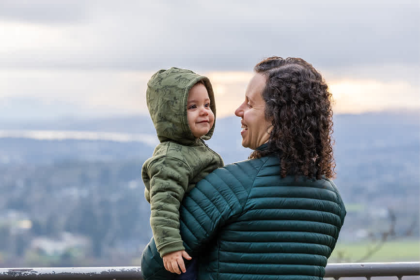 mother-and-child-enjoy-scenic-view-from-mount-doug-2025-03-18-09-26-03-utc 1