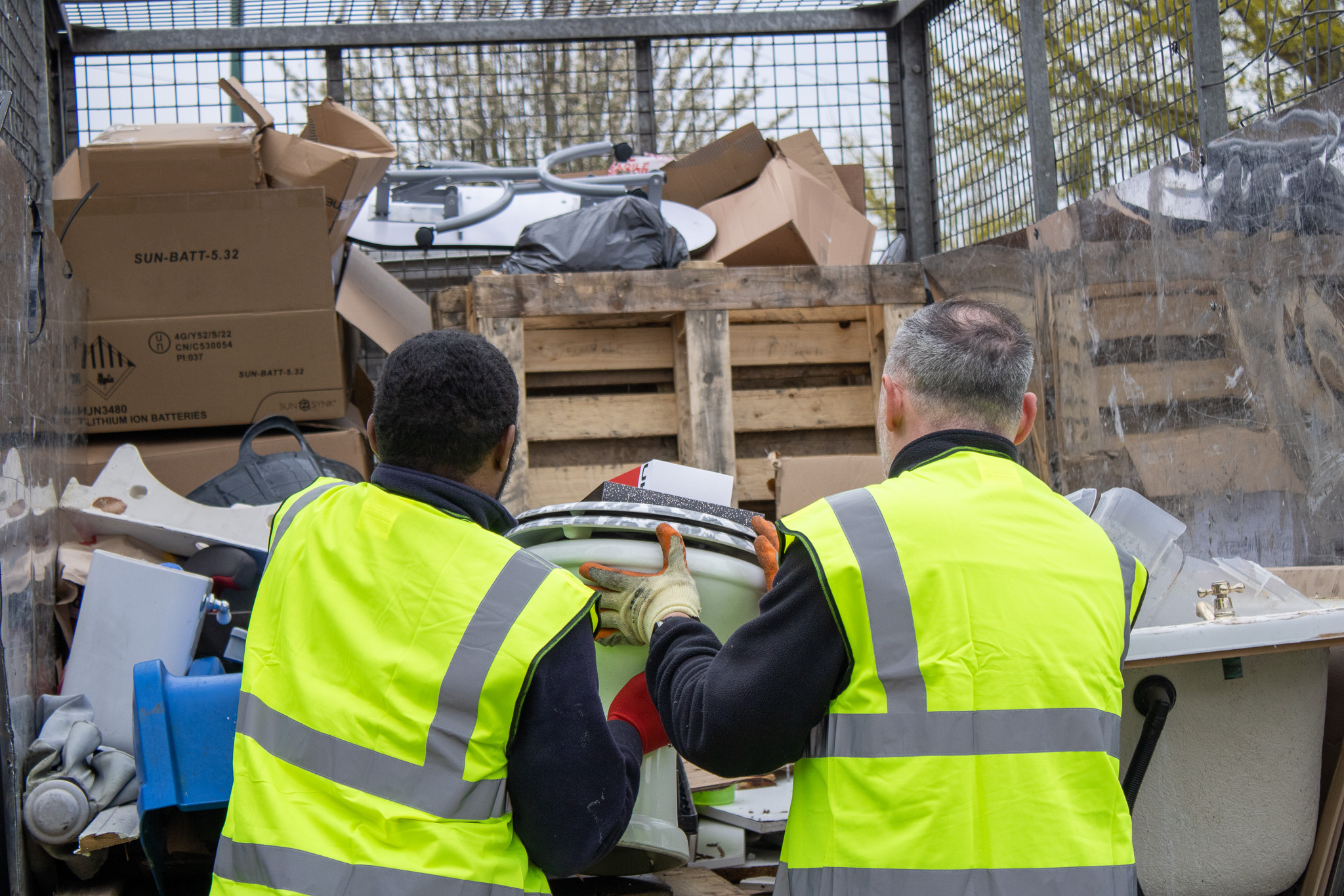 council bulky waste collection Brighton worker loading furniture into truck