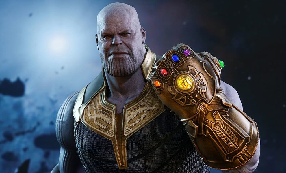 Thanos wearing the gauntlet with all Infinity Stones present