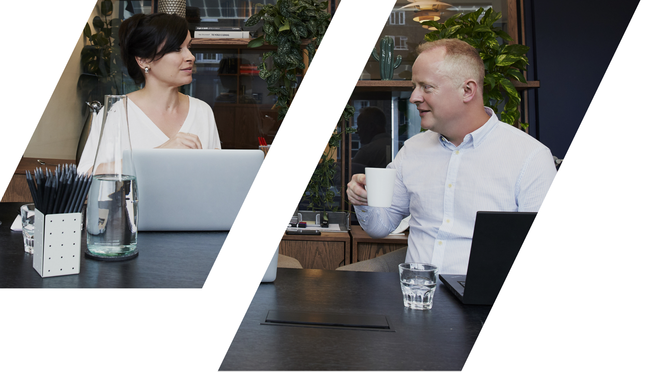 Man and women looking at each other in an office