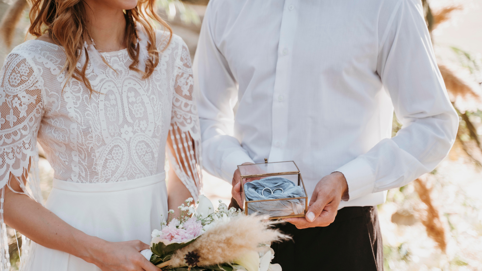 Young bride and groom having a beach wedding
