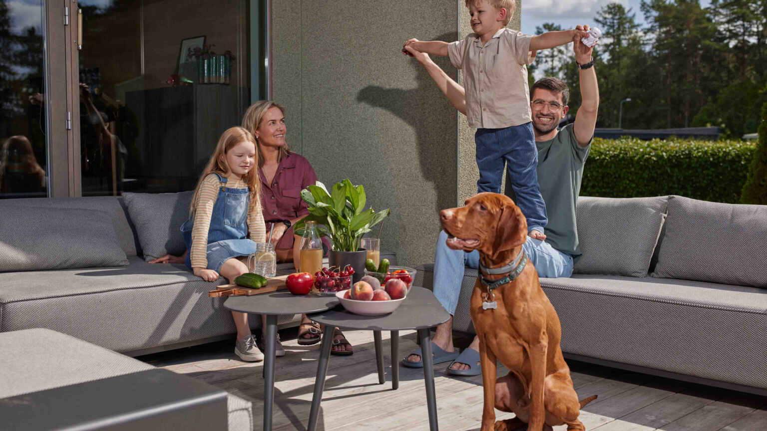 family sitting outside
