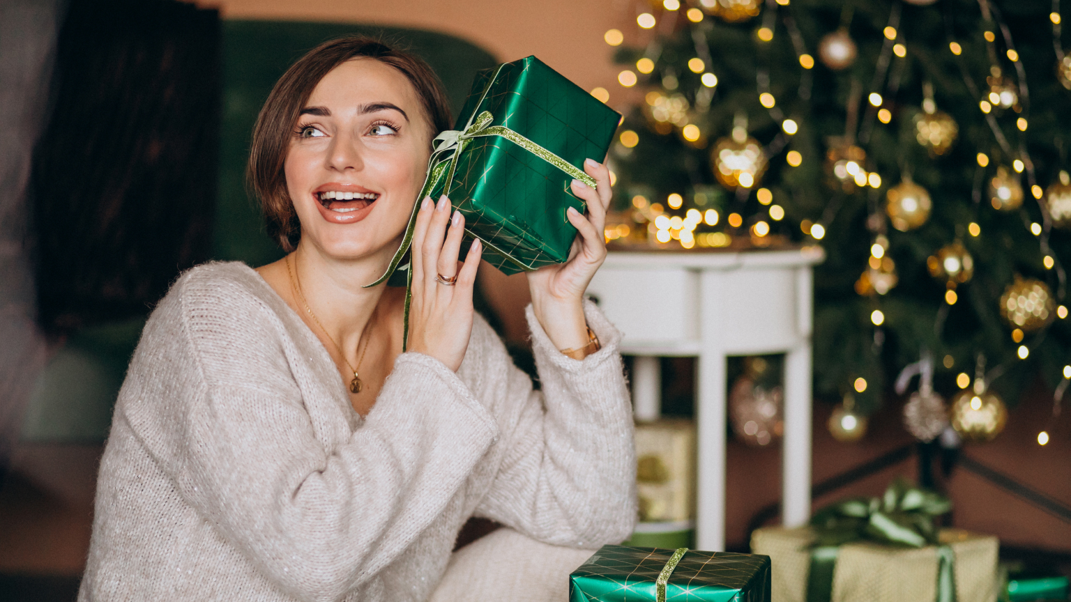 young-woman-with-christmas-present